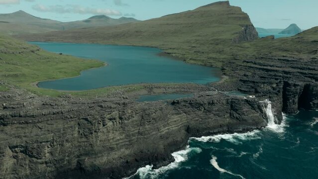 Drone shot from Lake Sørvágsvatn and the Trælanípa in Faroe Islands.