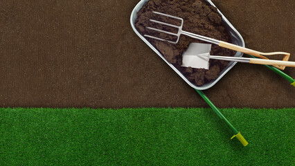 Gardening tool equipment. Wheelbarrow, spade and pitchfork top view on ground soil background and...