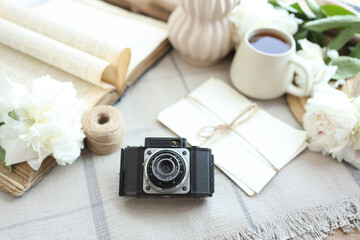 retro photo camera with book and vintage letters