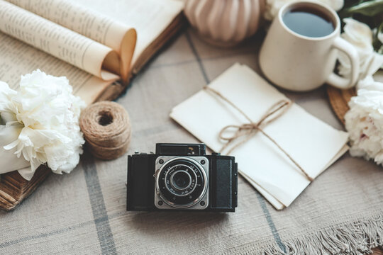 retro photo camera with book and vintage letters