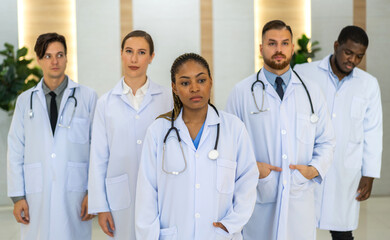 Fototapeta premium Group of professional medical doctor team meeting training medical in uniform working discussing and talk with patients record, teaching medic team, walk in hospital.health medical care concept