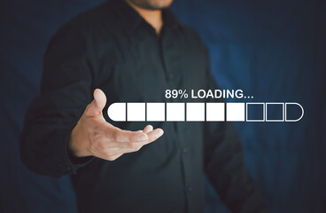 Businessman using smartphone and laptop uploading to cloud computing to download and loading data information and upload on system network application.
