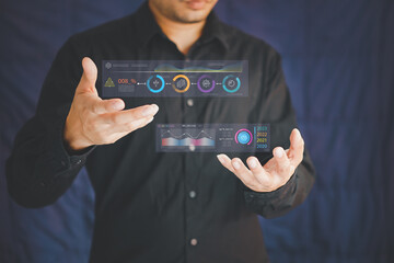 Big Data Technology for Business Finance Analytic Concept. Modern graphic interface shows massive information of business sale report, profit chart and stock market trends analysis on screen monitor.
