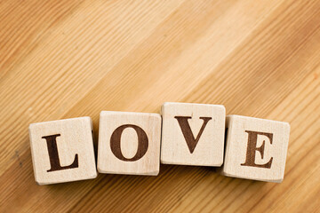Love word written in wooden blocks