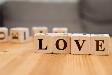 Love word written in wooden blocks