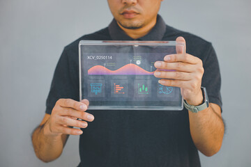 Big Data Technology for Business Finance Analytic Concept. Modern graphic interface shows massive information of business sale report, profit chart and stock market trends analysis on screen monitor.
