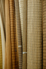 Samples of bamboo curtains for windows in a store