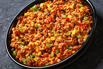 Mexican ground beef casserole with rice, beans