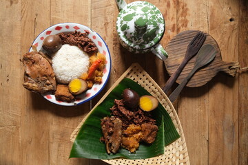 Gudeg Manggar is is a traditional Yogyakarta food made from young coconut flowers cooked with spices of brown sugar, egg, coriander, coconut milk, galangal, and a number of spices. Indonesian food. 