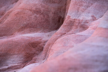 The Siq, narrow red canyon wall texture background in Petra, Jordan, UNESCO World Heritage Site