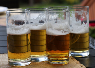 Glasses of cold tasty ligth beer