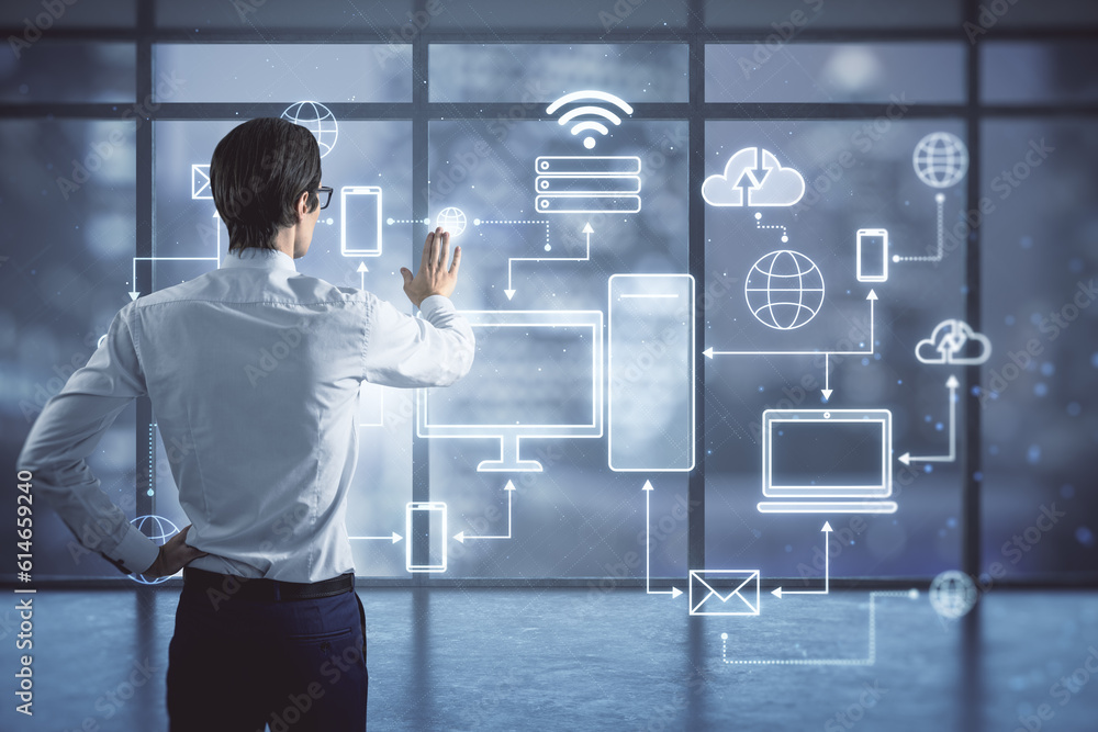 Poster Internet of things, IOT and cloud computing service concept with man back view touching digital screen with devices connected to digital storage in a data center over the Internet on window background