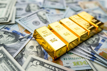 Paper us money with gold bars, saving and investment wealth