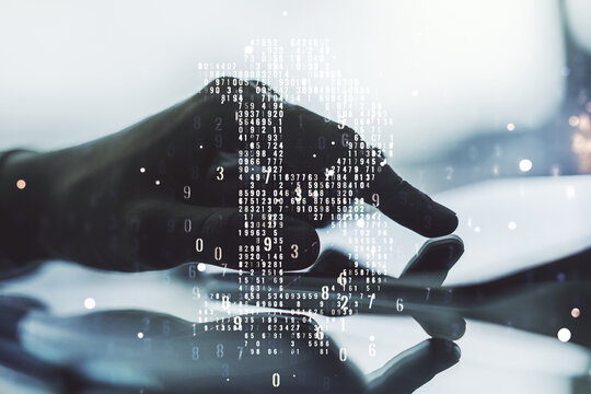Double exposure of creative Bitcoin symbol hologram and hand working with a digital tablet on background. Mining and blockchain concept