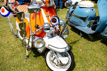 Raamstickers The front end of a classic Lambretta scooter on display at a scooter rally on the green in the seaside town of Hunstanton on the North Norfolk coast © yackers1