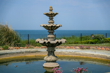 Close and selective focus on a water fountain in the clifftop gardens on Hunstanton cliff on the North Norfolk coast