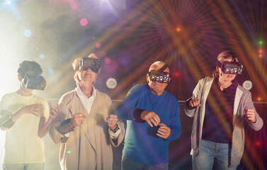 Obraz premium Rapturous grandparents with grandchildren are looking for way out of virtual escape room