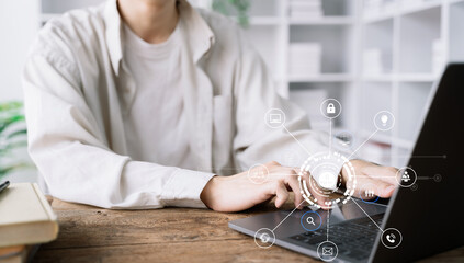 Copyright or patent concept, Person hand using laptop computer, tablet and smartphone with virtual screen copyright icon trademark, Creation ownership against piracy at office.