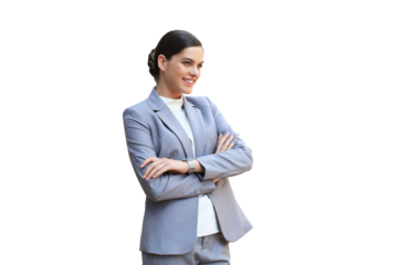 Attractive young woman in suit looking and smiling while standing on a transparent background.