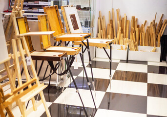 different easels and sketchbooks for artists in a store for creativity
