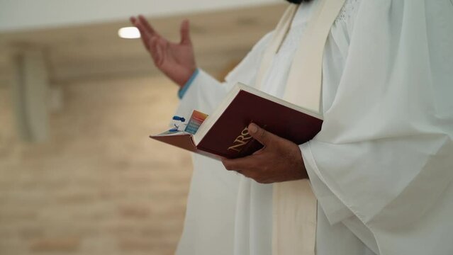 the pastor waves his hand and reads the psalter