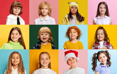 Collage made of portraits of cheerful little boys and girls, children posing, smiling against...
