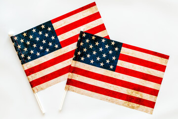 Celebrating independence day with USA flags as background