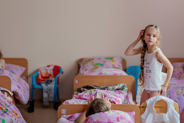 Kindergarten. Junior School. Quiet hour. Dream. We returned from a walk. The children go to bed. In...