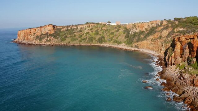 4k drone flight moving to the side footage (Ultra High Definition) of Torre Conca beach. Amazing morning seascape of Mediterranean sea. Attractive outdoor scene of Sicily, Italy, Europe.