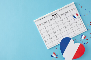 Bastille Day celebration theme for a party. Top view flat lay of patriotic hearts, calendar, glitter stars on light blue background with empty space for promo or text