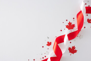 Celebration theme happy Victoria day in Canada. Top view flat lay of paper maple leaves, stars, patriotic ribbons on white background with empty space for message or promo
