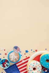 Fototapeta na wymiar The concept of a candy-coated party on the Fourth of July. Top view vertical flat lay of donuts, cupcake, candies, national flag, glitter on pastel beige background with space for promotion or text