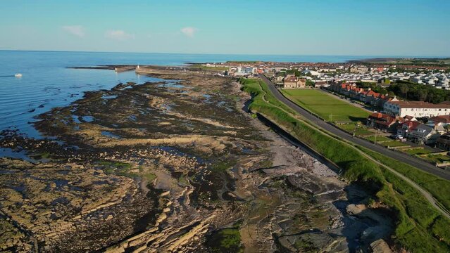 Seahouses is a large village on the North Northumberland coast in England. It is about 20 kilometres (12 mi) north of Alnwick, within the Northumberland Coast Area of Outstanding Natural Beauty.