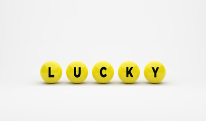 The word lucky on yellow spheres on white background.