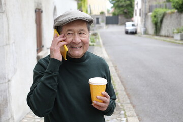 Ethnic man talking on the phone in urban setting 
