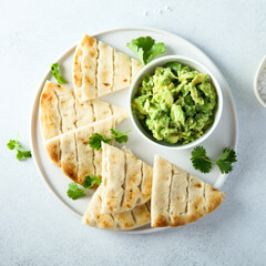 Mashed avocado with fresh flatbread
