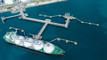 LNG (Liquified Natural Gas) tanker anchored in Gas terminal gas tanks for storage. Oil Crude Gas...