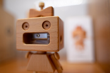Pencil sharpener in the form of a wooden robot. DIY idea. Recycled materials