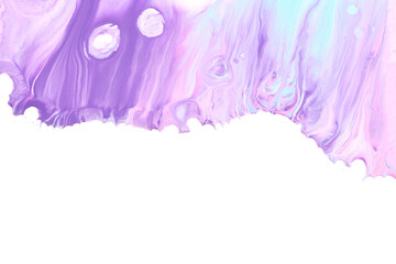 Paint drops flowing down on white paper. Purple blue ink blots abstract background