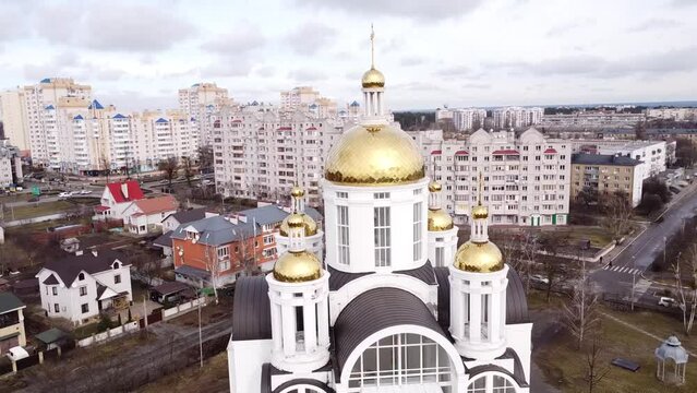 Drone shot moving around the Church of Saint Andrew and Pyervozvannoho All Saints. Ukraine, Bucha - Kyiv Oblast.