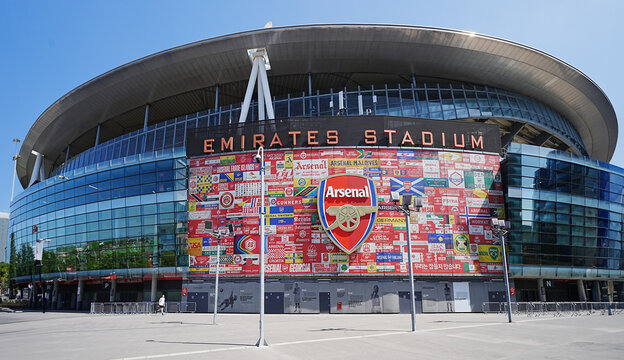 Arsenal Football Clubs home, the Emirates Stadium, showing 'The 'Arsenal' logo, taken on a blue sunny day
