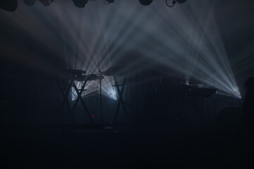 musical instruments set on stage and spotlights and stage lights