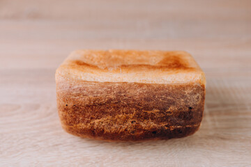 Fragrant white bread with a crust, bread on the table