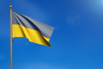 Ukranie. Flag blown by the wind with blue sky in the background