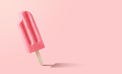 Bitten fruit and berry popsicle on pink background
