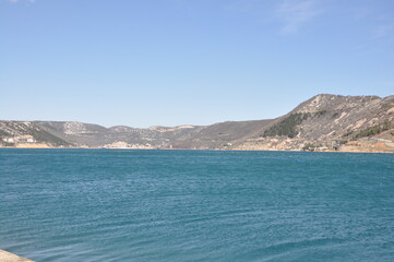 Naklejka premium Panoramic view of Bakar city with rough Adriatic sea in Croatia.Rough Adriatic Sea and Bura wind in Bakar gulf.
