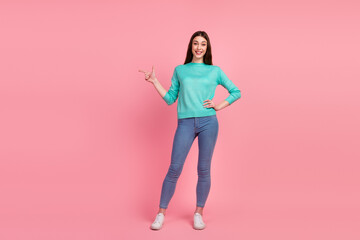 Full body photo of positive lady demonstrate offer empty space isolated on pastel color background