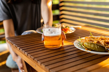 Female drinking apple cider with dinner