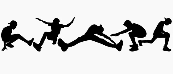 Happy and free young boys dancing silhouettes