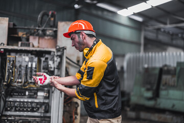 Industrial technician had his hand caught by a piece of machinery. Accidental machine crushing occurred during routinely scheduled maintenance. Bandages as starting treatment before hospitalization.